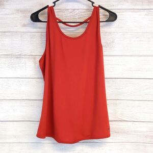 Cycle house powered by Marika burnt orange back cut out workout tank